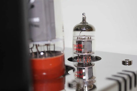 Close-up of A12 EL34 12AX7 ECC83 Tube Amplifier for Hi Fi Stereo, focusing on the tube placement with vintage warmth dynamics.