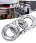 Five silver axial ball thrust bearings with 5/8-inch bore and outer races