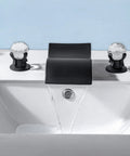 Widespread Matte Black Bathroom Sink Faucet With Crystal Knobs, Two Handles, Wide Waterfall Spout, shown on white basin