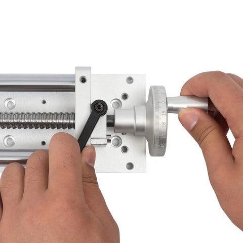 Manual Sliding Table CNC Slide With 400mm Travel Ball Screw Linear Stage For DIY Routers And Lathes in use, close-up on adjustment knob.