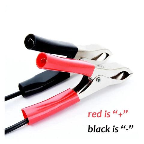 Versatile 12V 60W Fluid Extractor Pump For Cars And Boats With Matching Tubes To Suck Oil, Gasoline, Or Water Fast From Your Engine Bay For Quick Outdoor Maintenance Work Today with red and black battery clips.
