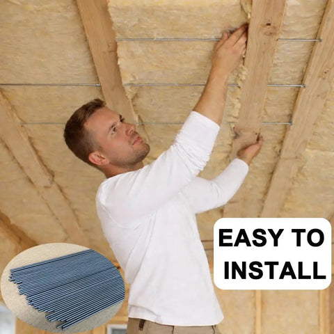 Man installing Solid As A Rock Spring Steel Insulation Support Wires 16 Inch 50 Pack Heavy Duty Batt Hangers in ceiling.