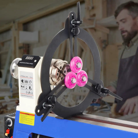 Three Point Woodturning Adjustable Steady Rest For A 12 Inch Lathe Swing with non marring wheels on a midi lathe in workshop