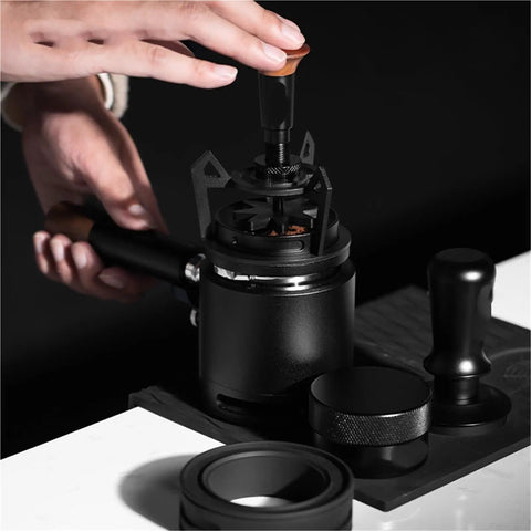 Close-up of Rotary Espresso WDT Tool Set With Precision Dosing Funnel And Upright Stand demonstrating clump clearing action.