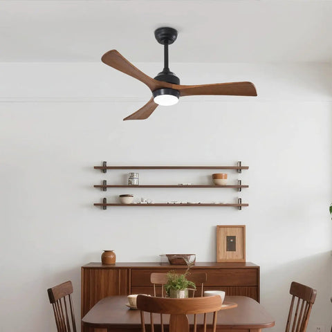 42" Solid Wood Blades Ceiling Fan with Lights in matte black, showcased in a dining room setting with wooden decor.