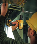 Person using Heavy Duty 20V Max Lithium Ion Cordless Drill Driver Kit Featuring Rock Solid 1/2 Inch Chuck in a work setting.