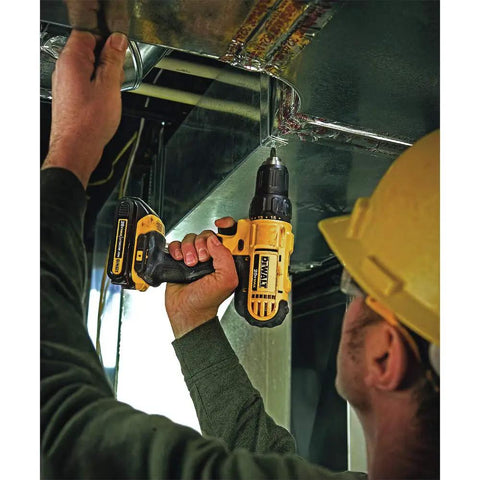 Person using Heavy Duty 20V Max Lithium Ion Cordless Drill Driver Kit Featuring Rock Solid 1/2 Inch Chuck in a work setting.