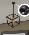 Close-up of a black carbon steel threaded ball knob and screw cap in use on a ceiling light fixture, from the 18Pcs M4 x 9mm Threaded Ball Knobs and Screw Caps Set for Lighting DIY Projects, Black Carbon Steel Hardware, Dope Ball Lamp Decoration Nuts, Ball-Nuts for Fixtures, Replacement and Customization.