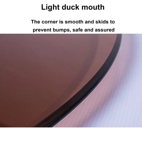 Close-up of edge of Round Lazy Susan Turntable, 9mm tempered glass, clear brown finish, for kitchen and dining table use.