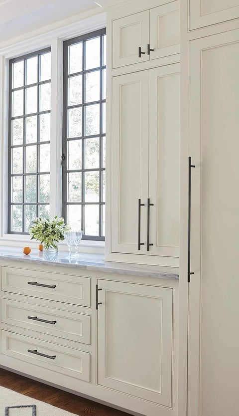 Oil Rubbed Bronze Bar Cabinet Pull 3 Inch Center To Center Contemporary Drawer Handle 5-3/8 Inch installed on kitchen cabinets