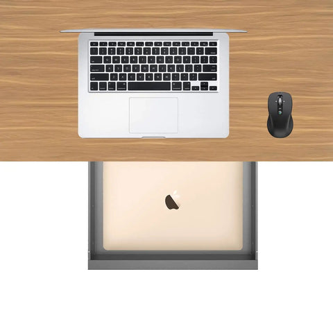Slick Under Desk Pull Out Drawer Slide Cabinet Game Changer Gear Fits Standing And Standard Workspaces No Sweat Organization Setup Nineteen Inches Wide Thirteen Point Four Deep with laptop and mouse on wood desk.