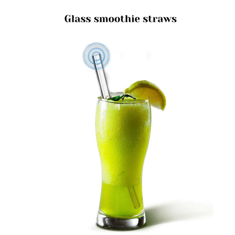 Glass smoothie straws in lemon smoothie with garnish