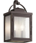 11 Inch Outdoor Wall Light With Clear Seeded Glass In Rubbed Bronze Finish, Classic Lantern Vibe For Traditional Or Transitional Homes, Durable Weatherproof Aluminum, Damp Rated Exterior Fixture, Easy Mount For Porch And Patio