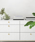 White dresser with 10 Pack Brushed Gold Cabinet Knobs With Gold Knurled Drawer Pulls Solid Kitchen Hardware visible in an interior setting