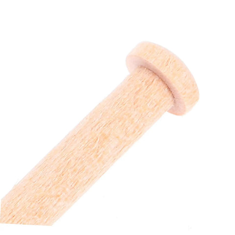 Close-up of a single T-shaped head beige wooden nail from the Miniature Wooden Nails Set For Dope Crafting And Woodworking With Solid Wood Rods For Tiny Train Wheels And Detailed Projects 20 Pieces Easy To Handle T Shaped Heads Durable Small Wood Nails For Crafts.