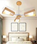 Slick Modern Metal 5 Light Pendant Chandelier Ceiling Lamp with wood accents in stylish bedroom setting.