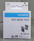 Packaging of L05A Brake Pads In ACE Ultegra Hard Resin For Road Bikes, Multicolor Set, showing front view design details