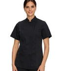 Women Short Sleeve Chef Coat In Sleek Black Legit Culinary Jacket With Heavy Duty Cotton Poly Blend, model wearing chef coat.