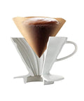 V60 Size 02 White Coffee Filters, brewing coffee in pour-over dripper, visible paper filter with coffee