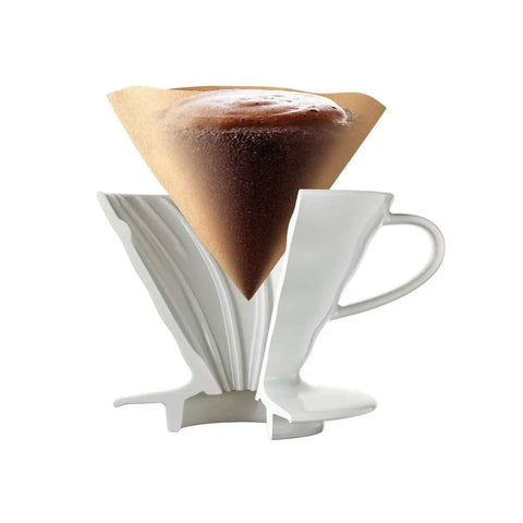 V60 Size 02 White Coffee Filters, brewing coffee in pour-over dripper, visible paper filter with coffee