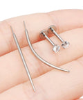 Titanium Threadless Medusa Piercing Jewelry Set 16G 10mm Flat Back Studs with taper tools and CZ stones on a hand