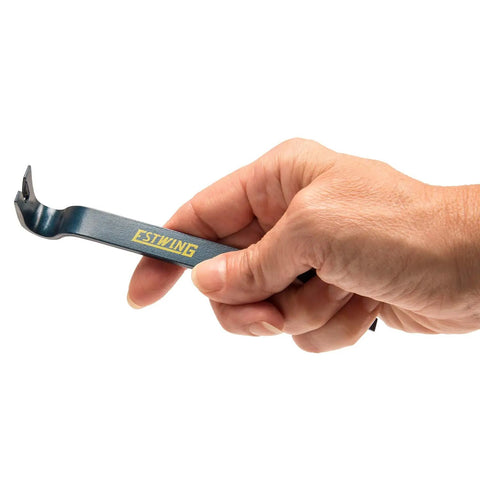 Hand holding a pry bar from 3 Piece Pry Bar Set With 5.5 Inch, 7.5 Inch And 10 Inch Nail Pullers, Wide Thin Blades, Forged Steel Construction