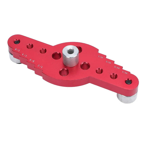Premium Aluminum Self Centering Dowel Jig Kit Featuring Stainless Guiding Rings. Close-up of the red aluminum dowel jig with guiding holes.