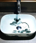 Rectangular Ceramic Vessel Sink For Bathroom Vanity Featuring A Super Sleek High Gloss Glaze That Stays Hella Tough And Keeps Your Space Looking Fresh All Year Round with floral design and central drain.