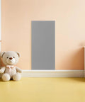 Rock Solid Premium Peel And Stick Xpe Foam Wall Pads on a nursery wall beside a plush teddy bear for safety.