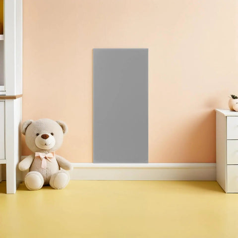 Rock Solid Premium Peel And Stick Xpe Foam Wall Pads on a nursery wall beside a plush teddy bear for safety.