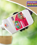 Deadbug Brew Insecticide Concentrate For Outdoor Gardens 32 Oz Mite Killer being poured from bottle into cap