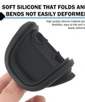 Close-up of a black silicone car door latch cover showcasing flexibility, part of Upgrade Your Whip With These Sick Silicone Car Door Latch Covers To Kill The Loud Clunks.