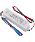 Rugged IP67 Waterproof LED Driver With 700 mA Constant Current For Outdoor Industrial Signage And Architectural Lighting Fully Sealed Enclosure Built To Weather Rain Dust And High Pressure Washdowns, white sealed 148x40x30 mm driver with wires
