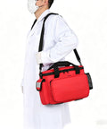 Healthcare professional carrying Well Organized Emergency First Aid Kit Bag For Home Travel Camping Car Office School Dorms.