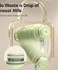 Hit The Road Ready Bottle Warmer For Quick Breast Milk And Formula Heat On The Fly with silicone seal design and green accents.