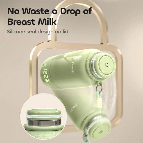 Hit The Road Ready Bottle Warmer For Quick Breast Milk And Formula Heat On The Fly with silicone seal design and green accents.