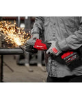 Gnarly Heavy Duty Cordless Angle Grinder Compatible With M18 Tools Offering 4 1 2 Inch 6 Inch Cutting Grinding Capability Brushless Motor pumps out sparks while cutting steel.