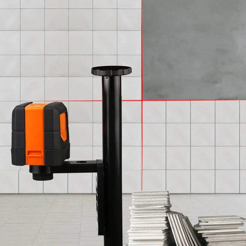50 Feet Self Leveling Laser Level With Horizontal And Vertical Cross Line Quick Pendulum Leveling System projecting on tiled wall