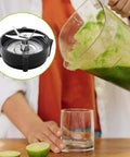Person pouring smoothie next to Pro 1200 Blender Blade Replacement For Oster Pro 1200 Blenders With Jar Base Bottom And Rubber O Ring Gasket, Replacement Parts Kit For Smoothies And Blending, Built To Last Hassle Free Install, High Quality