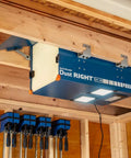 Compact Ceiling Air Filtration Unit With Heavy Duty Triple Stage Filters For Tight Garages And Low Ceilings mounted between joists.