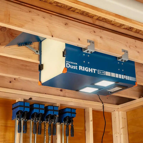 Compact Ceiling Air Filtration Unit With Heavy Duty Triple Stage Filters For Tight Garages And Low Ceilings mounted between joists.