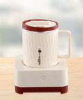 Electric Coffee Warmer And Dual Cooling Mug Goes Hard Keeping Your Drinks Hot Or Cold Exactly When You Want Them Milky White Red mug on heating pad