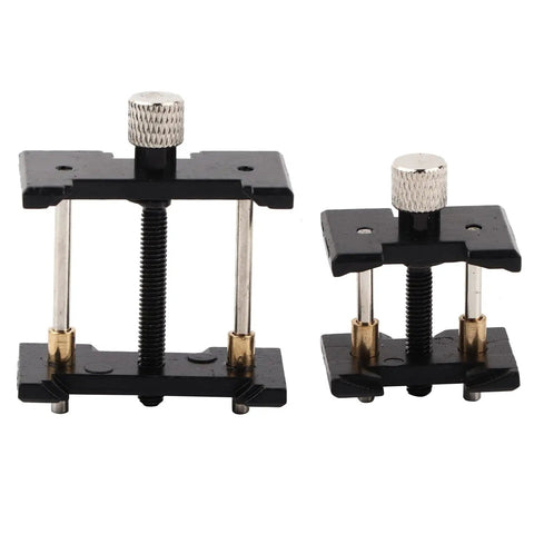 Two Piece Watch Movement Holder Kit With Non Slip Fixed Base and Plastic Repair Tool showing dual-size holders