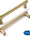 Two brushed brass cabinet pulls, 5 inch with 128MM hole centers, sleek gold finish, displayed on white background.