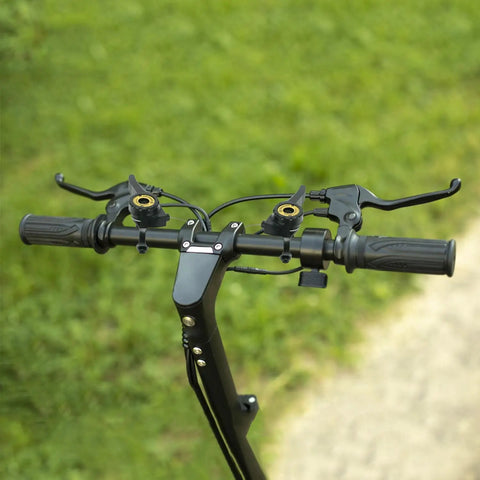 Handlebars with pair of variable speed bicycle shifters shift levers in black and silver tone for smooth gear changes.