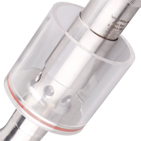 Close-up of a stainless steel 1.5-inch tri-clamp sanitary pressure-relief valve with gauge