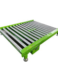 Industrial Mobile Scissor Lift Table With Electric Hydraulic Roller Top Built Like A Tank For Serious Heavy Lifting Durable Steel Powerhouse in green with rollers.