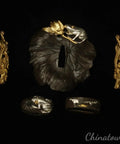 Brass Gold And Silver Plated Katana Fittings Set Tsuba Guard Menuki Fuchi Kashira on black background