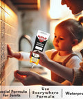 Person using Grout Repair Kit With 14 Oz White Grout Filler For Wall And Floor Tile Joints Ready To Use Pre Mix Includes Spatula And Sponge Quick Drying Mortar Fill Restore Cracked And Stained Grout on kitchen wall tile.