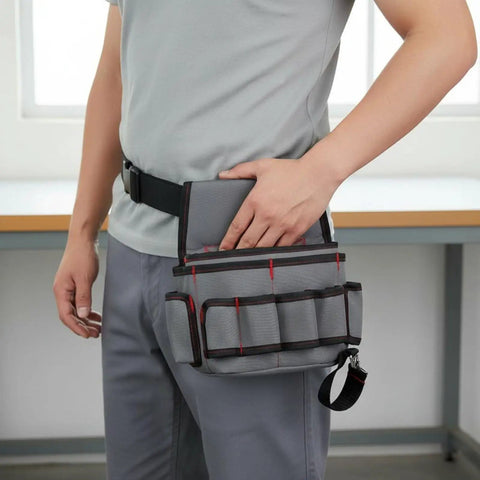 Rig Ready Waterproof Oxford Canvas Tool Belt Waist Pack With Slick Adjustable Strap And Killer Storage Loops Hella Comfortable For Electricians Crushing It On Site, worn by user, showcasing side storage compartments.